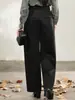 Los nuevos pantalones casuales negros de Sudu para mujer cuentan con costuras tridimensionales, un efecto adelgazante, bolsillos traseros de parche y un diseño holgado de pierna curva adecuado para ir al trabajo.