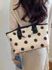Bolso grande de mano popular para mujer 2026 versión coreana moda moderno bolso de hombro elegante para el día a día bolso tote de lunares moderno