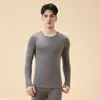 Nuevo conjunto térmico de camelia para otoño e invierno, alta elasticidad y comodidad, conjunto de capa base para calor y protección contra el frío, venta al por mayor de tops y pantalones de otoño