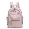 Mochila de Moda Casual Color Sólido Estilo Coreano Ligera para Viajes Campus Escuela Gran Capacidad Mochila para Estudiantes Venta al por Mayor