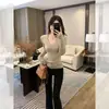 Nuevo suéter de punto con cuello en V 2025 para mujer, otoño e invierno, corte ajustado, elegante y versátil, adecuado como top de capa base