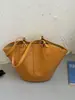 Bolso de mano tejido con textura simple y atmosférica estilo coreano para mujer 2026 Nuevo Pequeño de Nicho de Gama Alta para Viajes Diarios Bolso de Hombro Único