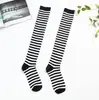 Directo de fábrica Calcetines largos hasta la rodilla a rayas de tres barras estilo Harajuku para danza de rendimiento estilo académico para damas Calcetines de Algodón Calcetines