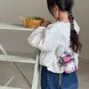Bolso Transfronterizo para Niños Otoño e Invierno Nuevo Moda Europea y Americana Letra Mini Bolso Cilindro Exquisito Bolso Cruzado de Cadena para Niñas Moderno