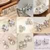 Pendientes Metálicos de Moda Creativa Estilo Ins Calados Corazón Estéreo Forma Geométrica Pétalos Estrella de Cinco Puntas Pendientes de Estilo Simple para Mujer