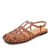 Sandalias Planas Casuales Versátiles para Playa Verano Tejido Cruzado Huecas Punta Abierta Sin Espalda Hebilla Única Sandalias Romanas 821-1