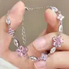 Estilo mismo de Xiaohongshu pulsera de flor de cerezo rosa con pedrería, lujo ligero, flor pequeña fresca, joyería de temperamento de dama, para chica