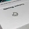 Pendientes de aro grises de estilo moderno con pasadores rectos, pendientes de aro de circonita, estilo clásico, pendientes de aro lisos coloridos con incrustaciones de diamantes súper brillantes.