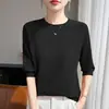 Top de punto fino de manga media con cuello redondo, de primera línea transfronterizo, listo para usar, primavera-verano, para mujer, camiseta corta holgada de manga raglán con corte