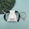 Recién Llegado Bolsa de Lona Blanca con Cordón Herramientas de Maquillaje Mascarilla Joyería Audio Joyería Pulsera Bolsa de Embalaje para Regalo