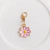 Colgante de aleación transfronterizo con forma de margarita que gotea, colgante de flores coloridas, llavero, adorno, joyería decorativa