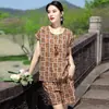 Nuevo Conjunto de Algodón y Seda de Verano para Madres de Mediana Edad y Mayores, Conjunto de Dos Piezas de Camisa Suelta de Manga Corta con Estampado Ondulado y Pantalones Cortos para Mujer