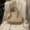 Bolsa de Praia Resort Color-blocking Palha Tecida Tendência Verão 2026 Nova Tecelagem de Concha Patchwork Estiloso Bolsa Transversal