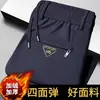 Pantalones casuales para hombre, colección otoño e invierno, pantalones para hombres de mediana edad, corte holgado, alta gama, resistentes a las arrugas, de pierna recta, con forro polar y buena caída, adecuados para deportes