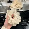 Goma para el pelo fruncida de encaje francés Color albaricoque lechoso Cuerda para el pelo con bordado 3D Estilo nicho de alta gama y suave Goma para el pelo de intestino grueso