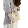 Bolso de mano de alta gama tipo cubo 2026 nueva moda versátil bolso cruzado para mujer, bolso de mano pequeño exquisito y súper popular para salir