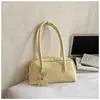 Bolsa de Ombro para o Dia a Dia com Design de Nicho para Mulheres 2026 Nova Coleção de Primavera Alta Qualidade Grande Capacidade Moderna Simples para Ombro ou Axila