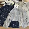 Roupa Infantil Estilo Coreano 2025 Novo Verão Meninas Saia Floral de Suspender Cardigan Infantil Cinza de Proteção Solar Conjunto de Duas Peças Tendência