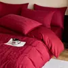 Juego de cuatro piezas de jacquard de doble capa de gasa teñido en hilo de algodón de alta gama para boda en rojo, sábana y funda de edredón de algodón puro, ropa de cama para boda