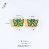 Tienda de oro con arena de oro esmalte de oro flor azul mariposa agujero pasante accesorios DIY pulsera tejida accesorios para collar