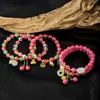 Pulseira Série Guofeng Mais Vendida Internacionalmente Cristal Rosa Diamante Colorido Bolsa da Sorte Fivela Ping An Lótus Rosa Bract Pulseira Artesanal para Mulheres