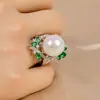 Nuevo anillo de perlas de moda transfronterizo en stock, anillo abierto de lujo ligero versátil de nicho estilo europeo y americano de alta gama para mujer
