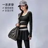 Conjunto de yoga de dos piezas de alta gama en bloques de color para mujer, cuello redondo, top corto de manga larga, cintura cruzada, pantalón falda de dos piezas falsas, deportivo