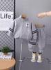 Traje de otoño para niño 2024 nuevo abrigo de primavera y otoño para niños bebé estilo extranjero manga larga conjunto de dos piezas una generación de cabello