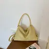 Bolso vintage de gran capacidad para mujer, nuevo bolso versátil de hombro y bandolera para el verano de 2026, bolsa de mano para el trabajo de comercio exterior transfronterizo