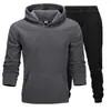 Conjunto de sudadera de color liso de talla grande para hombre y mujer, 220 g de tela, fabricante mayorista, conjunto holgado de talla grande de marca de moda para parejas