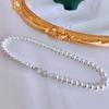 Collar elegante de lujo de alta gama con cadena de clavícula francesa multicapa apilada con perlas Shijia y cuentas ligeras, novedad de 2024.