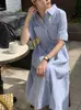 Los tamaños se han actualizado. Estilo minimalista de INS. Básico y versátil. Vestido camisa puro y estilizado con cintura ceñida