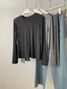 Camiseta elegante y versátil de mezcla de lana Tencel de manga larga para mujer, fina y suave para otoño, agradable para la piel, capa base de color liso