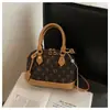 Bolso de Mujer de Alta Gama Estilo Chanel 2026 Modelo Nuevo Acolchado Bordado Bolso de Cadena Bolso Cubo con Cierre de Cordón Bolso de Hombro Único Bolso Cruzado