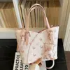 Bolso Cruzado de Hombro Tipo Cubo con Diseño de Nicho Exquisito Transfronterizo con un Toque de Alta Gama, Moda Nueva Verano 2026 Versátil para el Trabajo