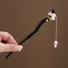 Nuevo Estilo Chino Elegante Tassel de Lirio del Valle Pasador de Pelo Estilo Antiguo Dinastía Han Pasador para Cheongsam Pasador de Madera Imitación Ébano Elegante Adorno para el Cabello para Mujeres