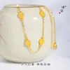 Collar Puzuo Gold Shop con diseño de flor de iris dorada arena, pequeño y redondo, de marca, para mujer, ideal para ir al trabajo, combina con todo, para novia.