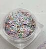 Uñas Macaron 1MM japonesas y coreanas amor estrella mini lentejuelas fluorescentes alto brillo estrella de cinco puntas parche material para uñas