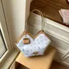 Bolso de hombro tote de gran capacidad con estampado fresco para mujer 2026 simple nuevo moderno moda primavera para ir al trabajo