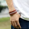 Suministro estable de fábrica directo de fábrica Pulsera de cuero tejido retro popular europea y americana pulsera de cuero al por mayor