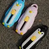 Cuchillo de utilidad magnético desmontable de pingüino con rebote automático, portátil y compacto, para oficina, apertura de paquetes y apertura de sobres