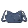 Moda nova transfronteiriça simples feminina casual versátil bolsa de ombro única grande capacidade multi-bolsos para o trabalho bolsa de mãe