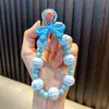 Llavero Creativo de Color Sólido con Lazo y Perlas, Correa para Teléfono Simple y Elegante, Cuerda Colgante Linda, Pequeño Regalo al por Mayor