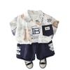Camisa de Manga Corta Sencilla con Estampado de Graffiti para Niños Verano Moda 2025 Nuevo Conjunto de Tres Piezas de Manga Corta para Niños Coreano