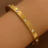 Pulseira de aço titânio mais vendida internacionalmente para mulheres europeias e americanas, banhada a vácuo com ouro 18K, não desbota, pulseira de aço inoxidável moderna
