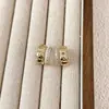 Brincos de Tarraxa Duplo Círculo com Rombos Cravejados de Pequenos Diamantes, Intelectuais e Sofisticados, com um Toque de Alto Padrão, Estilo Único e Fashion, Luxo Leve e Versátil