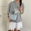 Bolso pequeño simple y elegante para mujer, nueva colección de verano 2026, bolso tipo cubo de moda, versátil y elegante, bolso cruzado para mujer
