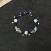 Elegante Novo Estilo Chinês Pulseira de Lótus e Borboleta Tecida à Mão Nicho de Alto Valor Pulseira de Flor de Lírio-do-Vale Branco e Estrela
