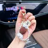Llavero de caramelo tejido a mano con perlas, un lindo y dulce colgante de hilo, un charm para bolso y un llavero para coche para mujer