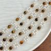 Otoño e invierno vintage estilo Maillard piedra ojo de tigre natural de alta calidad collar pulsera traje de perla redonda artificial de alto brillo